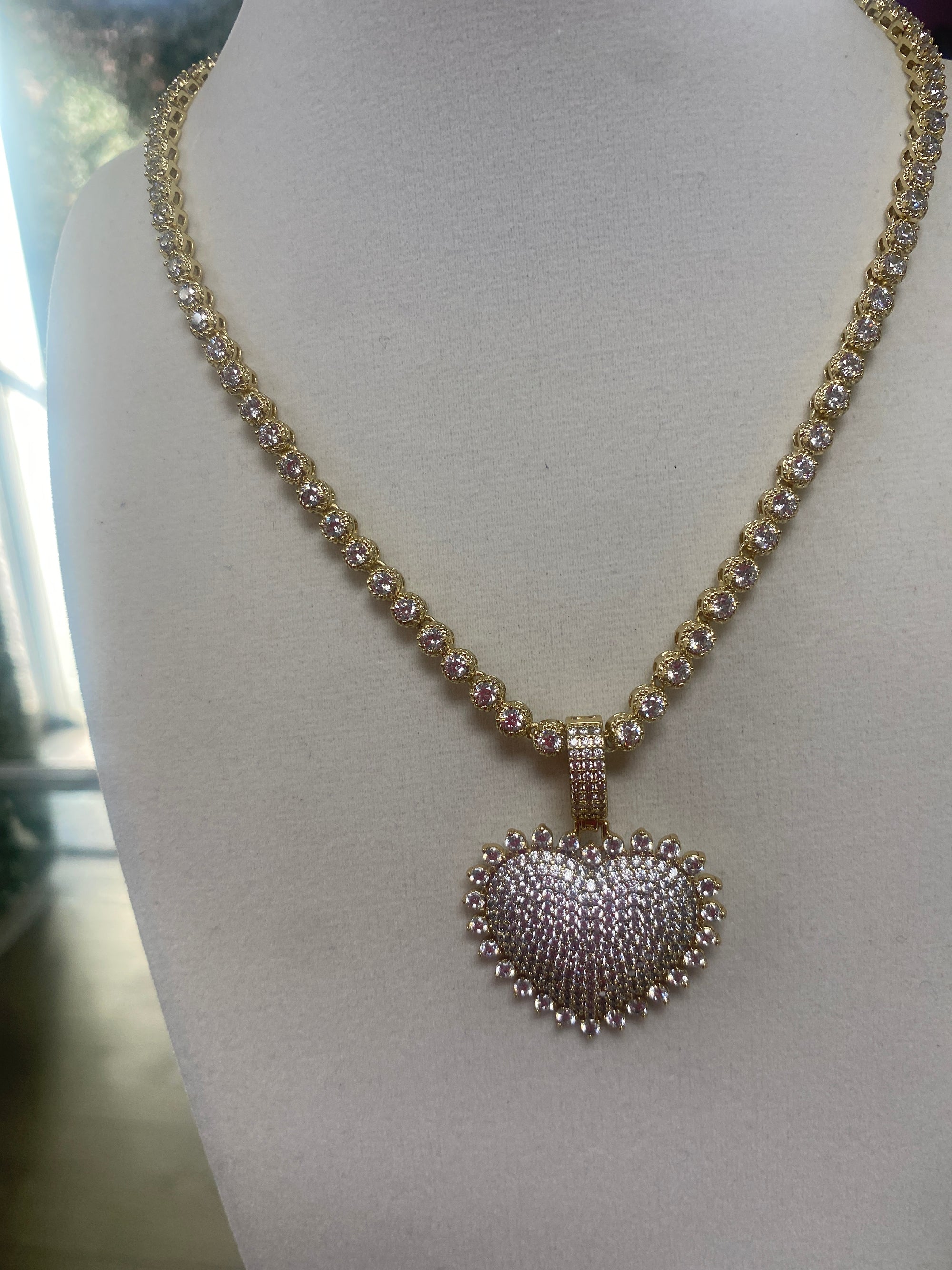 pretty tennis-style necklace with heart charm