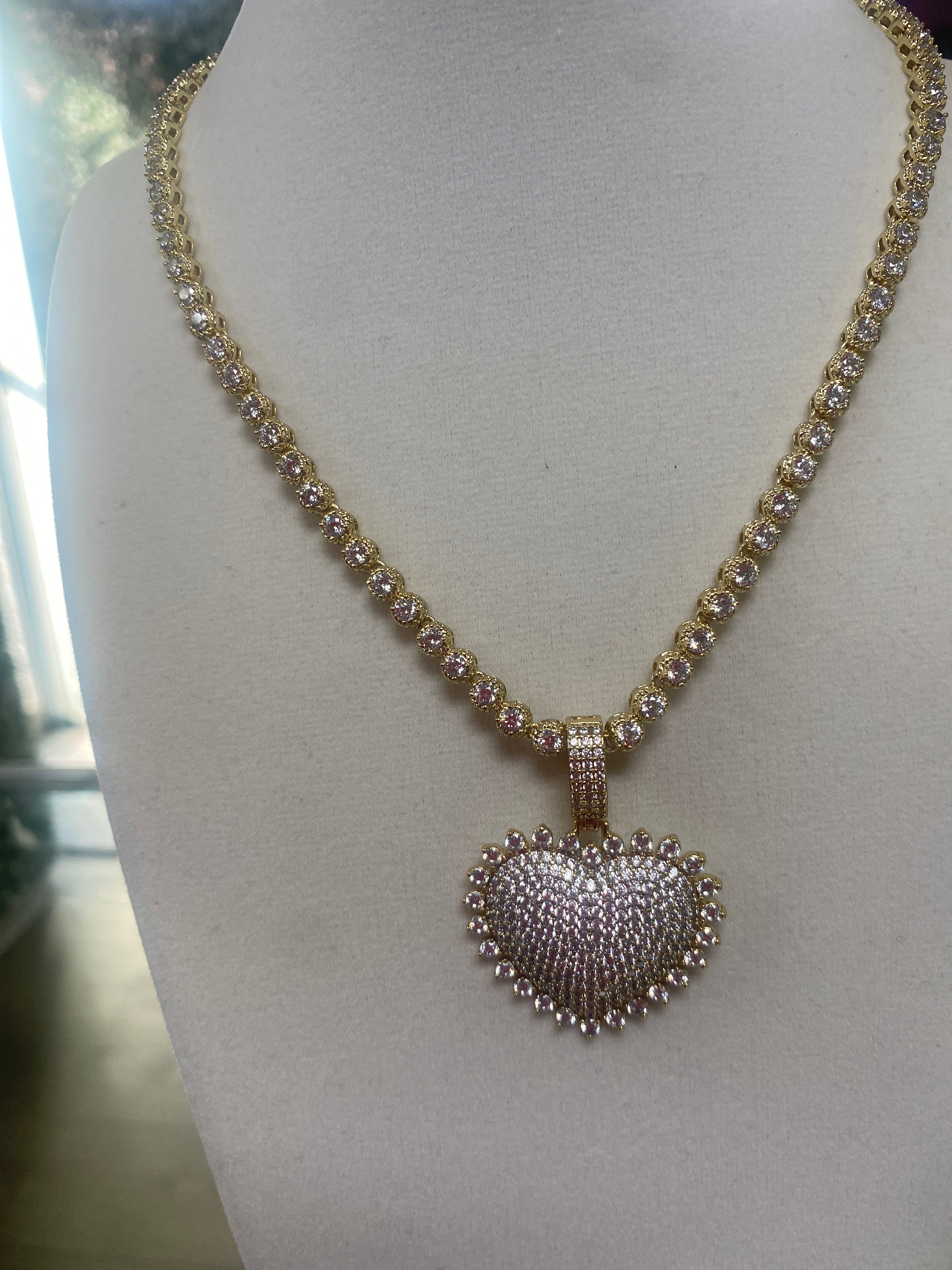 pretty tennis-style necklace with heart charm